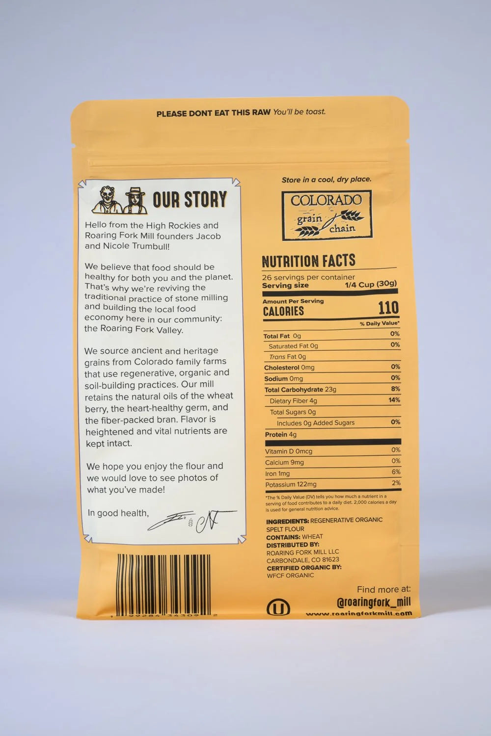 Back of a flour bag with text and nutrition labels on a gray background
